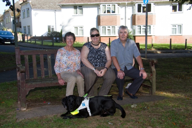 Haydn and Marrilyn Thomas of Sid Vale and East Devon Talking Newspapers with listener Heidi James and her dog Spencer. Ref shs 39 18TI 2167. Picture: Terry Ife